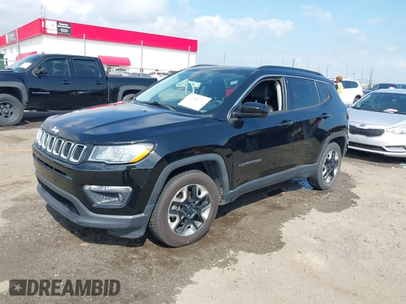 2021 Jeep Compass Altitude with VIN 3C4NJCBB0MT502423, listed as a IAAI auction lot 42006742 with 63,418 mi miles. Bid and sale history available at carsss.com. Image 18.