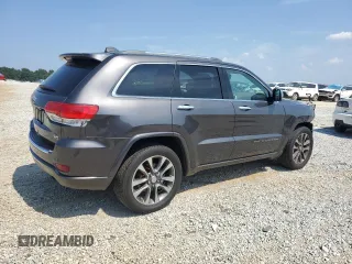 2018 Jeep Grand Cherokee High Altitude with VIN 1C4RJECG8JC239080, listed as a Copart auction lot 62141205 with 66,126 mi miles and Salvage title. Bid and sale history available at DreamBid. Image 3.
