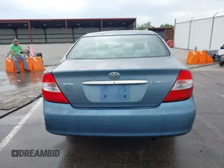 2002 Toyota Camry LE z VIN 4T1BE32KX2U617732, wystawiony jako IAAI lot #42208913 z przebiegiem Nie podano mil oraz . Historia ofert i sprzedaży dostępna na DreamBid. Obrazek 16.