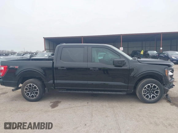 2023 Ford F-150 XL with VIN 1FTEW1C55PKD01184, listed as a IAAI auction lot 41700658 with 18,804 mi miles. Bid and sale history available at carsss.com. Image 13.
