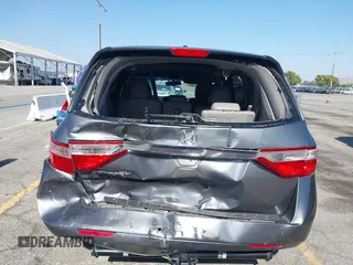 2011 Honda Odyssey EX-L with VIN 5FNRL5H64BB070836, listed as a IAAI auction lot 42520878 with 162,316 mi miles and . Bid and sale history available at DreamBid. Image 16.
