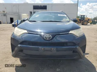 2017 Toyota RAV4 LE with VIN JTMZFREV3HJ121478, listed as a Copart auction lot 56215565 with 262,013 mi miles and Clean Title. Bid and sale history available at DreamBid. Image 5.