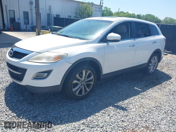 2011 Mazda CX-9 Grand Touring with VIN JM3TB2DAXB0330020, listed as a IAAI auction lot 42016796 with 156,155 mi miles. Bid and sale history available at carsss.com. Image 2.