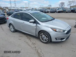 2018 Ford Focus SE with VIN 1FADP3F25JL259936, listed as a IAAI auction lot 41487679 with 117,525 mi miles and . Bid and sale history available at DreamBid. Image 1.