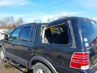 2004 Ford Expedition Special Service with VIN 1FMPU16L44LA17586, listed as a IAAI auction lot 41619534 with 140,299 mi miles. Bid and sale history available at carsss.com. Image 18.