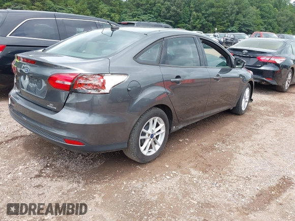 2016 Ford Focus SE z VIN 1FADP3F2XGL397092, wystawiony jako IAAI lot #42619802 z przebiegiem 232 252 mil mil oraz . Historia ofert i sprzedaży dostępna na DreamBid. Obrazek 4.