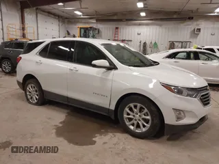 2018 Chevrolet Equinox LT z VIN 2GNAXSEV7J6138909, wystawiony jako IAAI lot #41295974 z przebiegiem 68 852 mil mil oraz . Historia ofert i sprzedaży dostępna na DreamBid. Obrazek 1.
