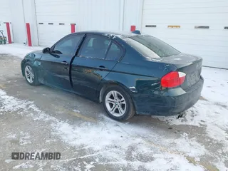 2008 BMW 3 Series 328xi with VIN WBAVC93588K042972, listed as a IAAI auction lot 41419822 with 134,843 mi miles. Bid and sale history available at carsss.com. Image 3.