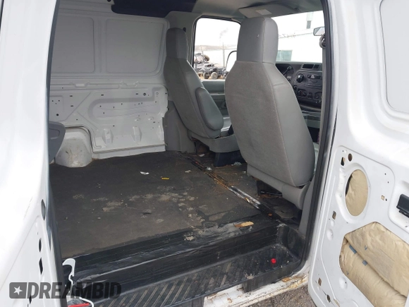 2009 Ford Econoline Cargo Commercial with VIN 1FTNE14W09DA91501, listed as a IAAI auction lot 41473298 with 99,129 mi miles and . Bid and sale history available at DreamBid. Image 8.