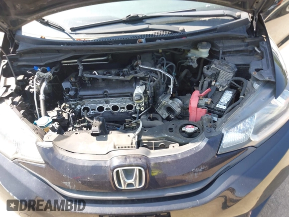 2015 Honda Fit LX z VIN 3HGGK5H51FM724566, wystawiony jako IAAI lot #42151755 z przebiegiem 168 744 mil mil oraz . Historia ofert i sprzedaży dostępna na DreamBid. Obrazek 10.