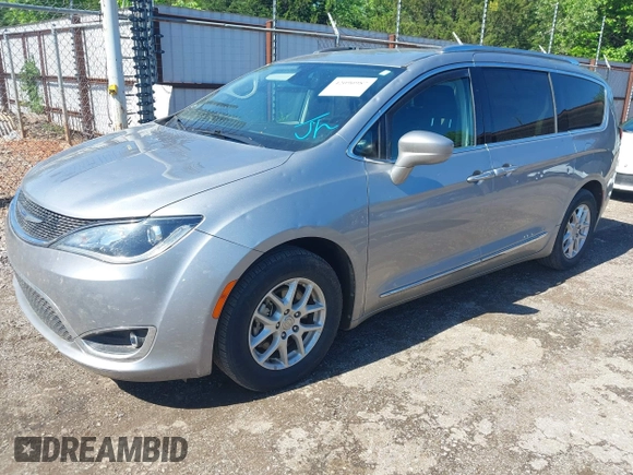 2020 Chrysler Pacifica Touring L with VIN 2C4RC1BG7LR140622, listed as a IAAI auction lot 42090987 with 125,377 mi miles and . Bid and sale history available at DreamBid. Image 2.