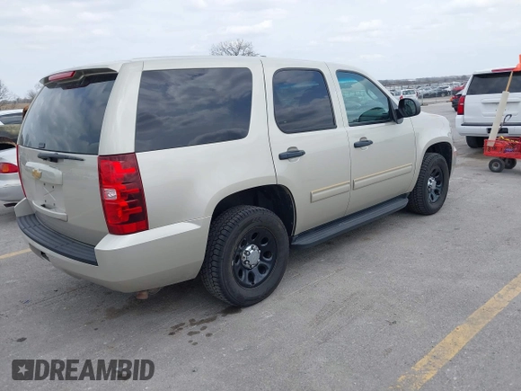 2013 Chevrolet Tahoe Commercial with VIN 1GNLC2E07DR266441, listed as a IAAI auction lot 42062162 with 133,321 mi miles and . Bid and sale history available at DreamBid. Image 4.