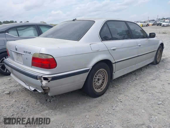 2001 BMW 7 Series 740iL with VIN WBAGH83451DP31468, listed as a IAAI auction lot 41929966 with 154,431 mi miles. Bid and sale history available at carsss.com. Image 4.