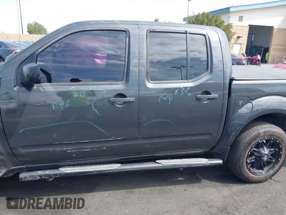 2014 Nissan Frontier SV with VIN 1N6AD0ER8EN756702, listed as a IAAI auction lot 42021294 with 135,143 mi miles and . Bid and sale history available at DreamBid. Image 18.