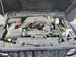 2020 Jeep Gladiator Rubicon z VIN 1C6JJTBG7LL197837, wystawiony jako Copart lot #58169095 z przebiegiem 59 578 mil mil oraz Szkoda całkowita • Salvage title. Historia ofert i sprzedaży dostępna na DreamBid. Obrazek 11.