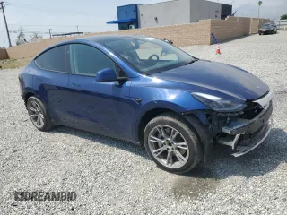 2024 Tesla Model Y z VIN 7SAYGDED3RF006264, wystawiony jako Copart lot #55210365 z przebiegiem 19 394 mil mil oraz Szkoda całkowita • Salvage title. Historia ofert i sprzedaży dostępna na DreamBid. Obrazek 4.