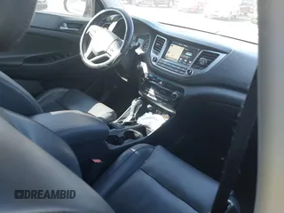 2016 Hyundai Tucson Limited with VIN KM8J33A26GU075023, listed as a IAAI auction lot 41656851 with 125,277 mi miles and . Bid and sale history available at DreamBid. Image 5.