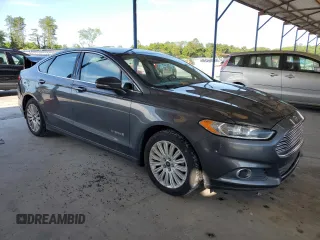 2015 Ford Fusion SE Hybrid with VIN 3FA6P0LU5FR218454, listed as a Copart auction lot 60682065 with 218,668 mi miles and Salvage title. Bid and sale history available at DreamBid. Image 4.