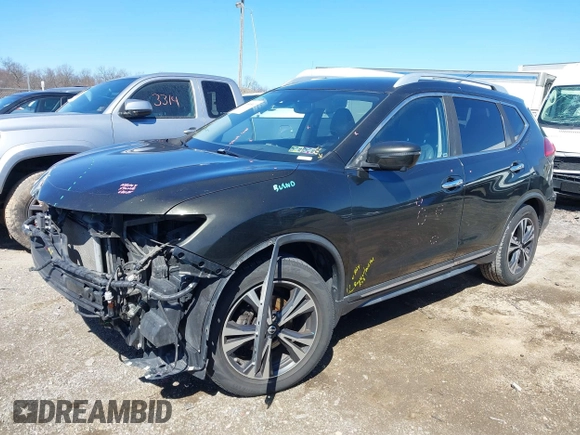 2017 Nissan Rogue SL with VIN JN8AT2MT8HW395084, listed as a IAAI auction lot 41858587 with 219,849 mi miles and . Bid and sale history available at DreamBid. Image 2.