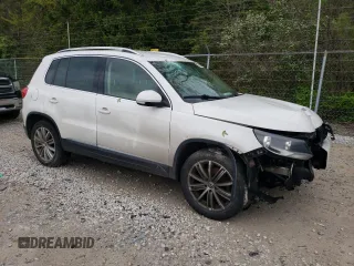 2013 Volkswagen Tiguan SE with VIN WVGAV7AX1DW527053, listed as a Copart auction lot 55934895 with 202,761 mi miles and Clean title. Bid and sale history available at DreamBid. Image 4.
