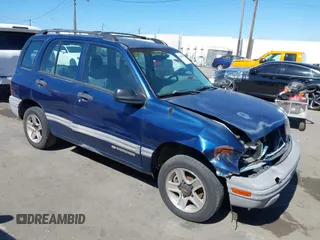 2002 Chevrolet Tracker z VIN 2CNBE13C026946577, wystawiony jako IAAI lot #41681988 z przebiegiem 125 211 mil mil oraz . Historia ofert i sprzedaży dostępna na DreamBid. Obrazek 1.