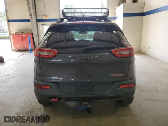 2014 Jeep Cherokee Trailhawk with VIN 1C4PJMBS6EW188531, listed as a Copart auction lot 50548105 with 108,081 mi miles and Salvage Title. Bid and sale history available at carsss.com. Image 6.