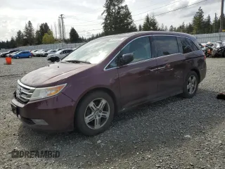 2012 Honda Odyssey Touring with VIN 5FNRL5H98CB137496, listed as a Copart auction lot 52458105 with 206,673 mi miles and Salvage Title. Bid and sale history available at carsss.com. Image 1.