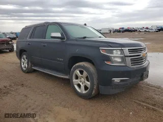 2015 Chevrolet Tahoe LTZ with VIN 1GNSKCKC7FR270737, listed as a Copart auction lot 51972625 with 0 mi miles and Salvage Title. Bid and sale history available at carsss.com. Image 4.