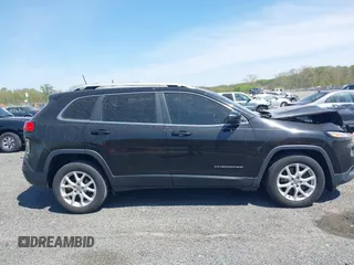 2017 Jeep Cherokee Latitude z VIN 1C4PJLCB1HW596240, wystawiony jako IAAI lot #42092862 z przebiegiem 105 087 mil mil oraz . Historia ofert i sprzedaży dostępna na DreamBid. Obrazek 13.