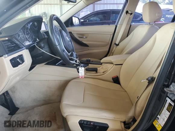 2015 BMW 3 Series 328i with VIN WBA3A5G51FNS87379, listed as a Copart auction lot 57752165 with 56,802 mi miles and Salvage title. Bid and sale history available at DreamBid. Image 7.