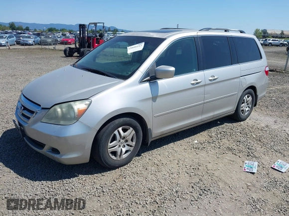 2006 Honda Odyssey EX-L with VIN 5FNRL38726B424923, listed as a IAAI auction lot 42099212 with 171,749 mi miles. Bid and sale history available at carsss.com. Image 2.