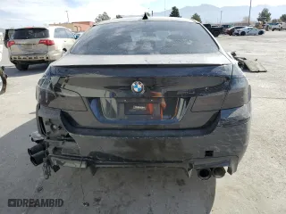 2015 BMW M5 with VIN WBSFV9C5XFD595148, listed as a Copart auction lot 46157335 with 77,582 mi miles and Salvage Title. Bid and sale history available at carsss.com. Image 6.