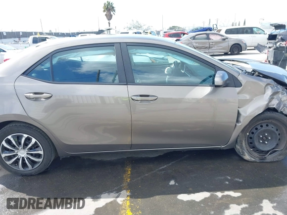 2019 Toyota Corolla L with VIN 5YFBURHE8KP892394, listed as a IAAI auction lot 41917095 with 89,073 mi miles. Bid and sale history available at carsss.com. Image 14.