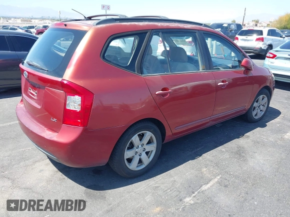 2008 Kia Rondo EX with VIN KNAFG525387174835, listed as a IAAI auction lot 42011406 with 138,656 mi miles. Bid and sale history available at carsss.com. Image 4.