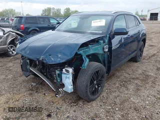 2021 Volkswagen Atlas SE with VIN 1V2LC2CA2MC228525, listed as a IAAI auction lot 42127917 with 74,707 mi miles and . Bid and sale history available at DreamBid. Image 2.