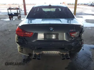 2015 BMW M4 with VIN WBS3R9C54FK335119, listed as a Copart auction lot 42120434 with 57,384 mi miles. Bid and sale history available at carsss.com. Image 6.