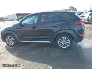 2017 Hyundai Tucson SE Plus with VIN KM8J33A41HU327540, listed as a IAAI auction lot 41820850 with 129,227 mi miles. Bid and sale history available at carsss.com. Image 14.
