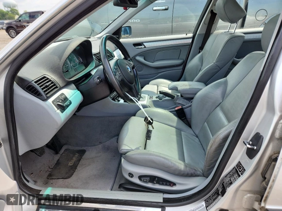 2004 BMW 3 Series 330xi with VIN WBAEW53464PG10935, listed as a Copart auction lot 63155905 with 165,240 mi miles and Clean title. Bid and sale history available at DreamBid. Image 7.