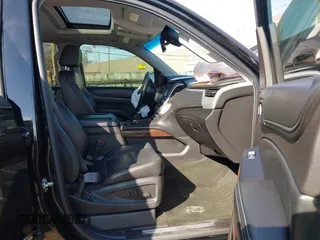 2016 GMC Yukon SLT with VIN 1GKS2BKC5GR253038, listed as a IAAI auction lot 41790030 with 101,039 mi miles. Bid and sale history available at carsss.com. Image 5.