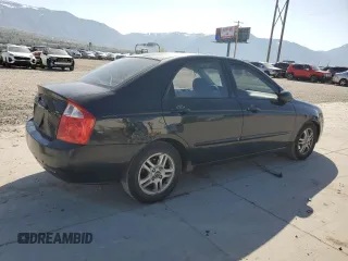 2005 Kia Spectra LX with VIN KNAFE122555102997, listed as a Copart auction lot 54191025 with 142,071 mi miles and Salvage Title. Bid and sale history available at carsss.com. Image 3.