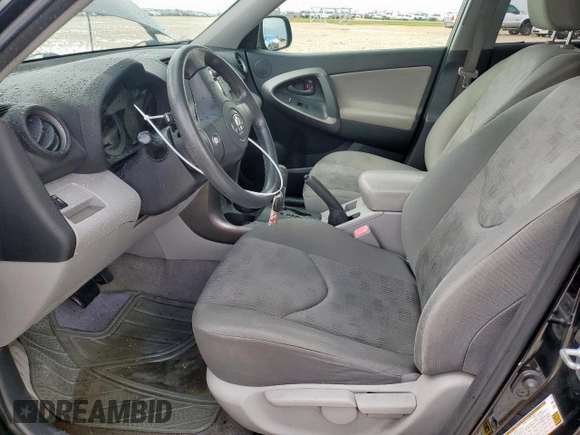 2010 Toyota RAV4 with VIN JTMZF4DV5AD023853, listed as a Copart auction lot 62354245 with 191,590 mi miles and Salvage title. Bid and sale history available at DreamBid. Image 7.