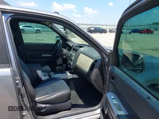 2008 Mercury Mariner Premier with VIN 4M2CU87118KJ08023, listed as a IAAI auction lot 42545623 with 161,639 mi miles and . Bid and sale history available at DreamBid. Image 5.