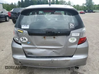 2009 Honda Fit Sport with VIN JHMGE88469S064405, listed as a Copart auction lot 61413745 with 179,497 mi miles and Salvage title. Bid and sale history available at DreamBid. Image 6.