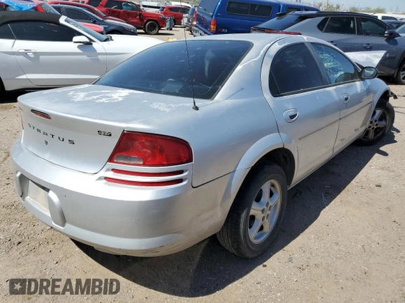 2006 Dodge Stratus SXT z VIN 1B3EL46X06N231101, wystawiony jako Copart lot #72078524 z przebiegiem Nie podano mil oraz Szkoda całkowita • Salvage title. Historia ofert i sprzedaży dostępna na DreamBid. Obrazek 3.