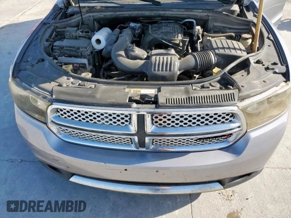 2013 Dodge Durango SXT z VIN 1C4RDHAGXDC697865, wystawiony jako Copart lot #52635305 z przebiegiem 206 980 mil mil oraz Czysty tytuł • Clean title. Historia ofert i sprzedaży dostępna na DreamBid. Obrazek 12.
