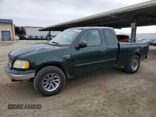 2003 Ford F-150 XL with VIN 1FTRX17L73KA47012, listed as a Copart auction lot 47410495 with 206,967 mi miles and Salvage title. Bid and sale history available at DreamBid. Image 1.