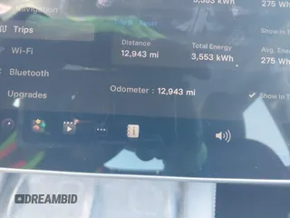 2023 Tesla Model Y Performance with VIN 7SAYGDEF5PF823122, listed as a IAAI auction lot 41546480 with 12,943 mi miles and . Bid and sale history available at DreamBid. Image 14.