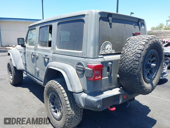 2023 Jeep Wrangler Rubicon with VIN 1C4JJXFG7PW541813, listed as a IAAI auction lot 42640045 with 53,645 mi miles and . Bid and sale history available at DreamBid. Image 3.