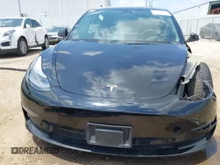 2023 Tesla Model 3 with VIN 5YJ3E1EA8PF454210, listed as a IAAI auction lot 42326822 with 43,200 mi miles and . Bid and sale history available at DreamBid. Image 13.