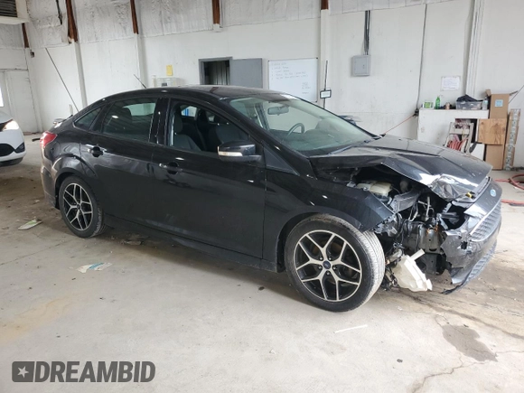 2015 Ford Focus SE с VIN 1FADP3F29FL274320, выставлен на аукционе Copart как лот 55434445 с пробегом 149 126 миль миль и Списание • Salvage title. История ставок и продаж доступна на DreamBid. Изображение 4.
